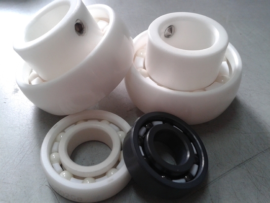 ZrO2 UC205 เซรามิกใส่ลูกบอลเบียริง PTFE กรงที่มีเส้นปรับในระบบขนส่ง